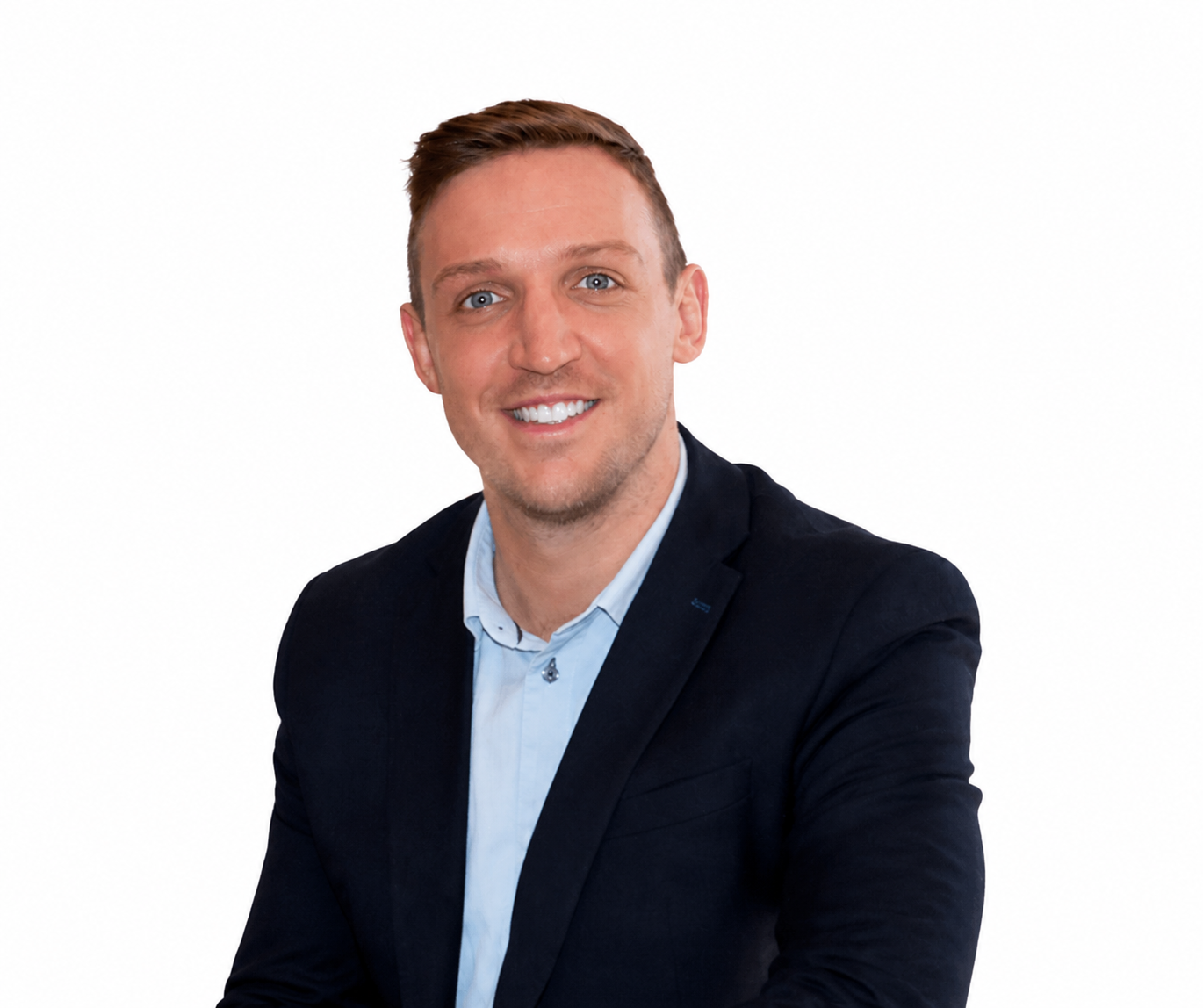 Professional headshot of a smiling man in a navy blazer and light blue shirt against a white background.